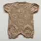 6-12M Hunter + Rose beige smiley face knitted romper