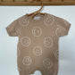 6-12M Hunter + Rose beige smiley face knitted romper